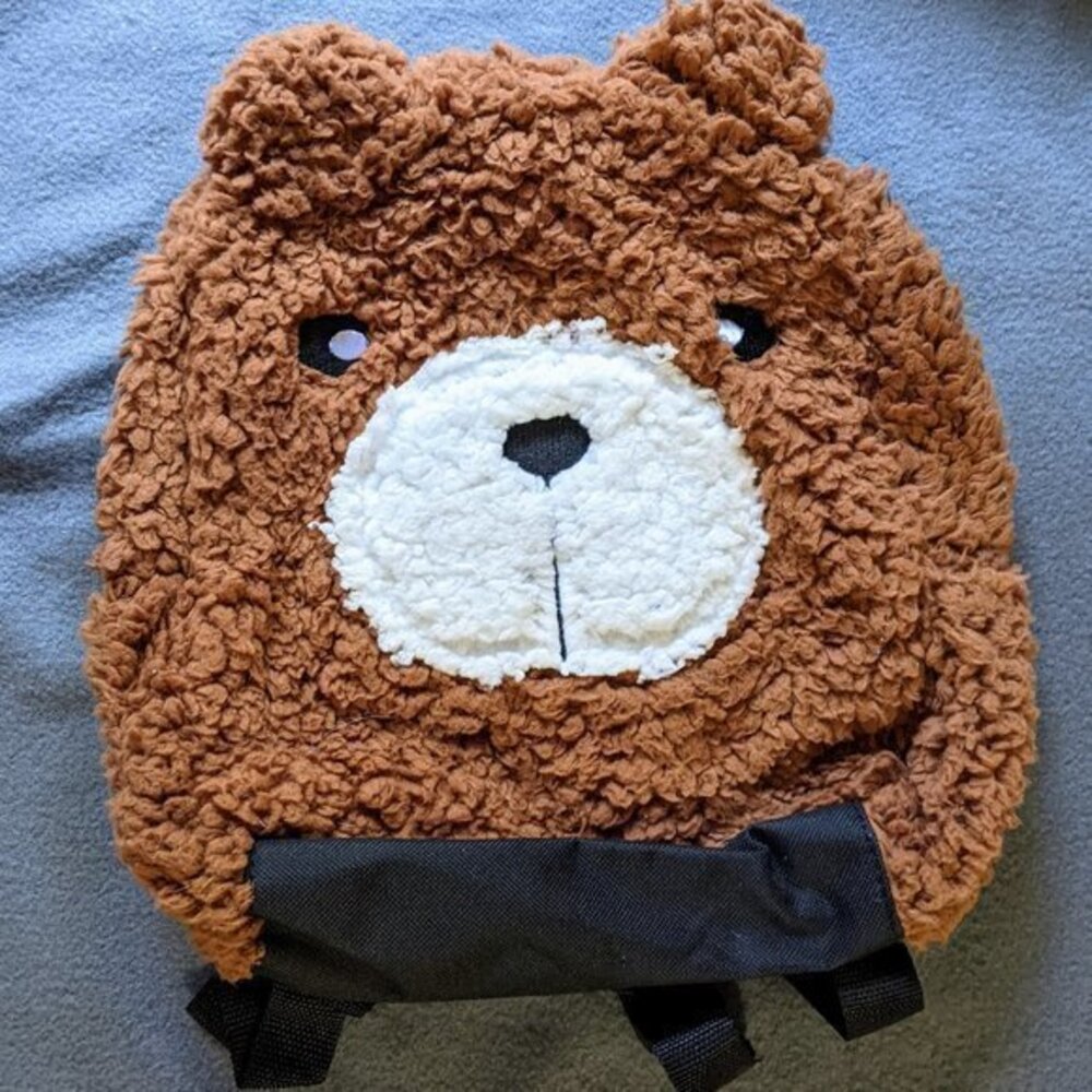 Fuzzy teddy bear face backpack brown